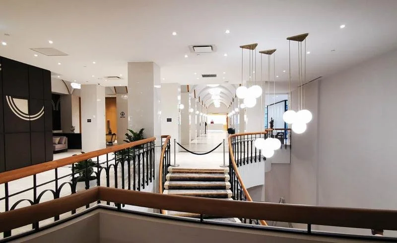 Chic lamps and railings of the lobby of Montreal Marriott Chateau Champlain.