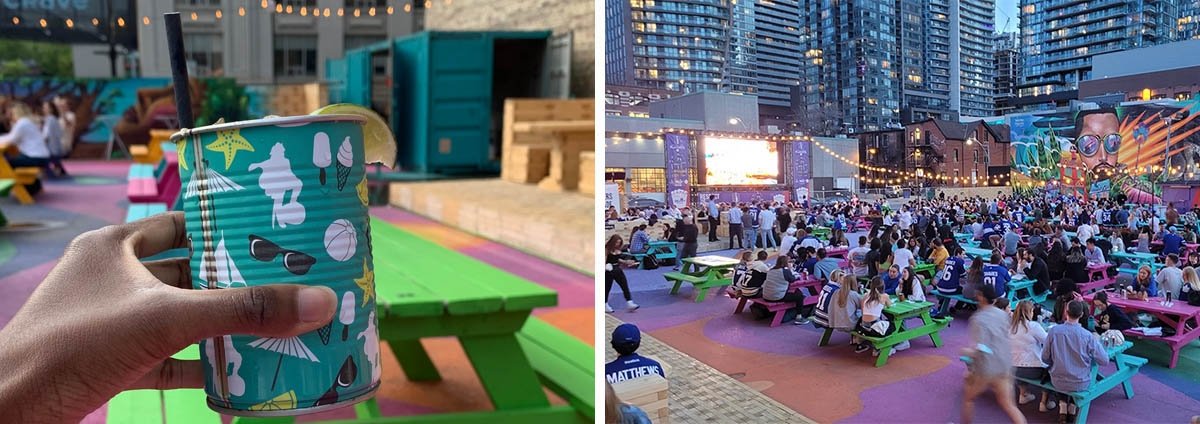 Crowds sit along bright benches at RendezViews outdoor patio bar.