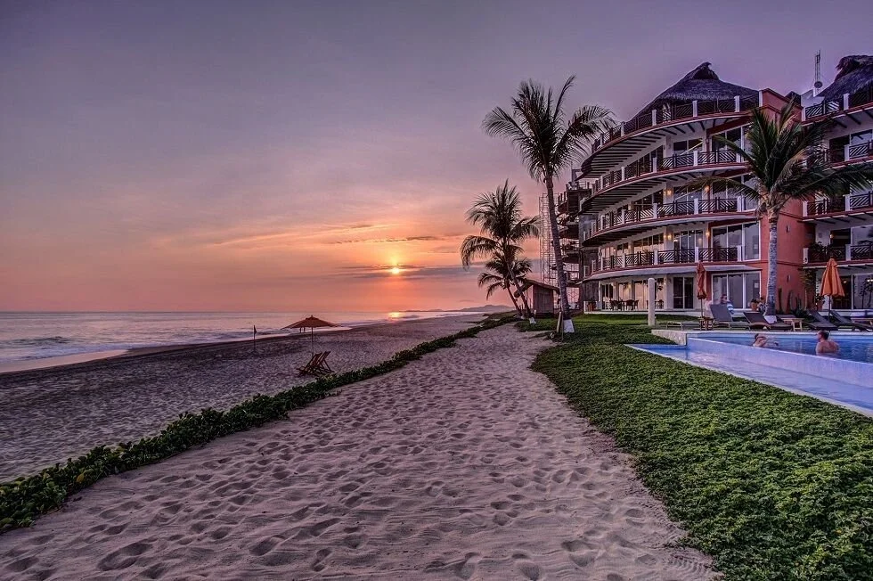 A purple-orange sunset over Vivo Resorts near Puerto Escondido.