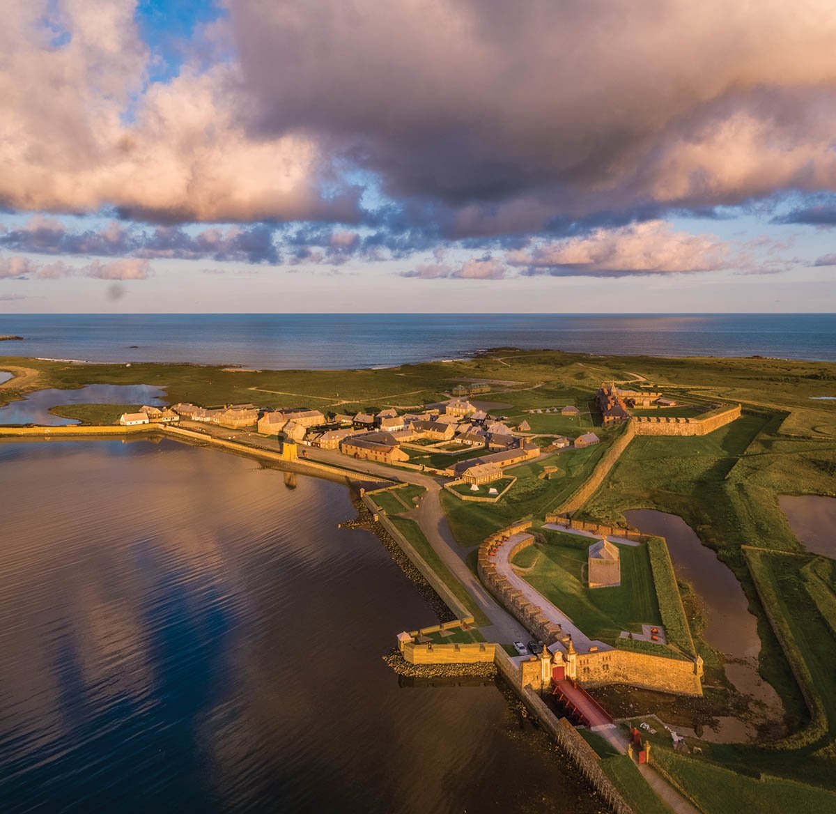 The fortress of Louisbourg National Historic site during sundown.