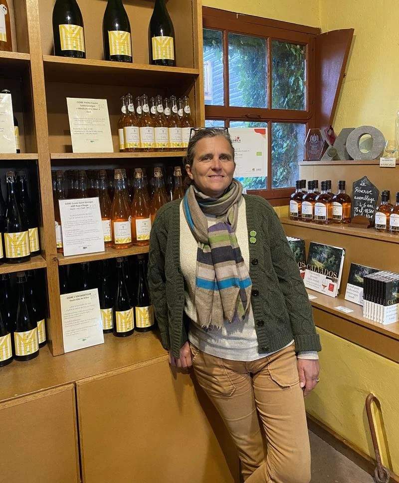 Agathe Letellier in front of the wines from Manoir d'Apreval.
