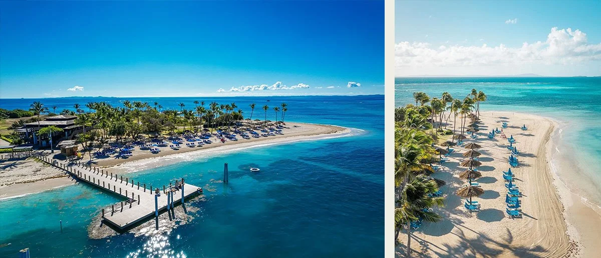 The bright blue waters of Palomino island under a clear, blue sky in Puerto Rico.