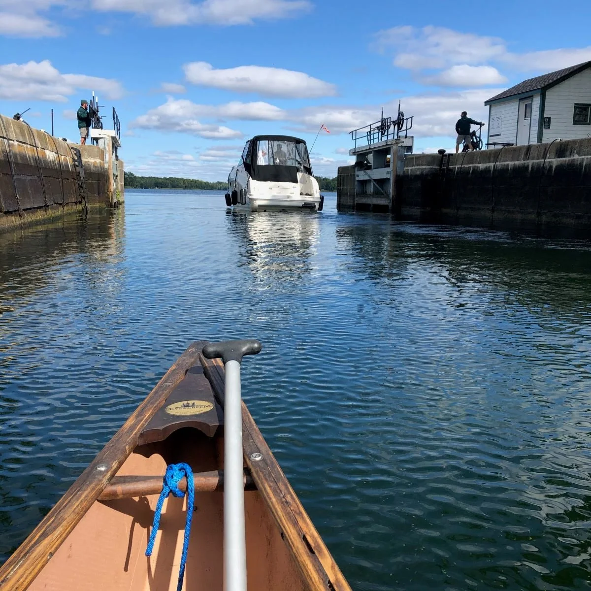 A man paddles out of the locks at the Narrows.