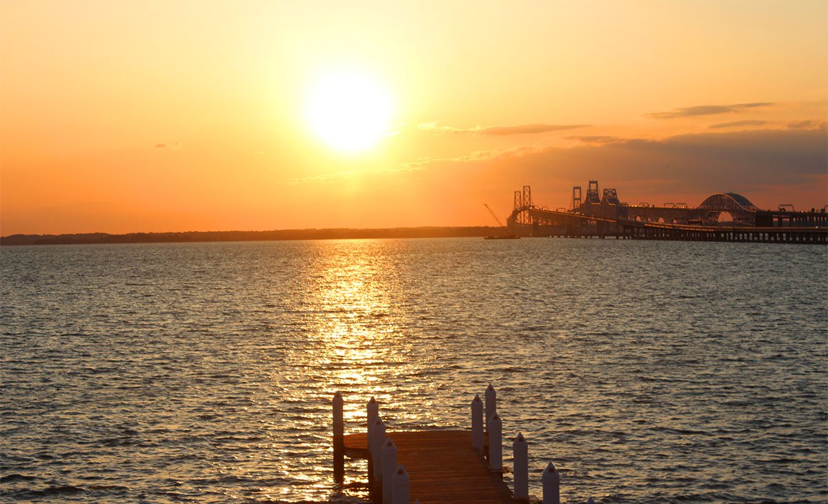 A bright orange sunset near Libbeys Coastal Kitchen and Cocktails.