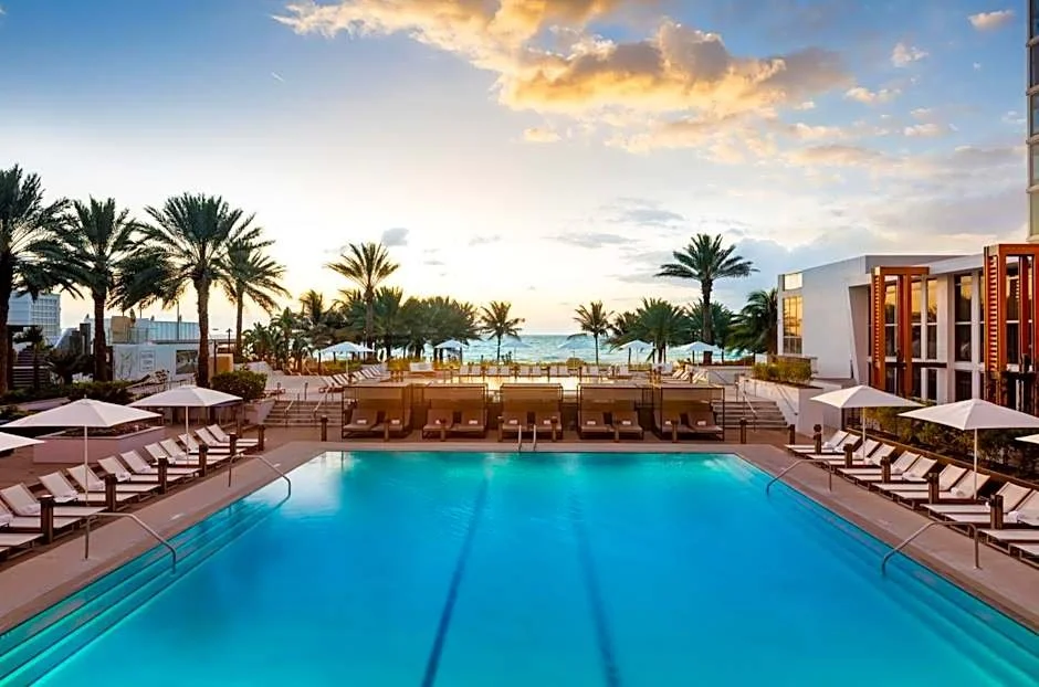 Eden Roc Hotel pool during sunset.