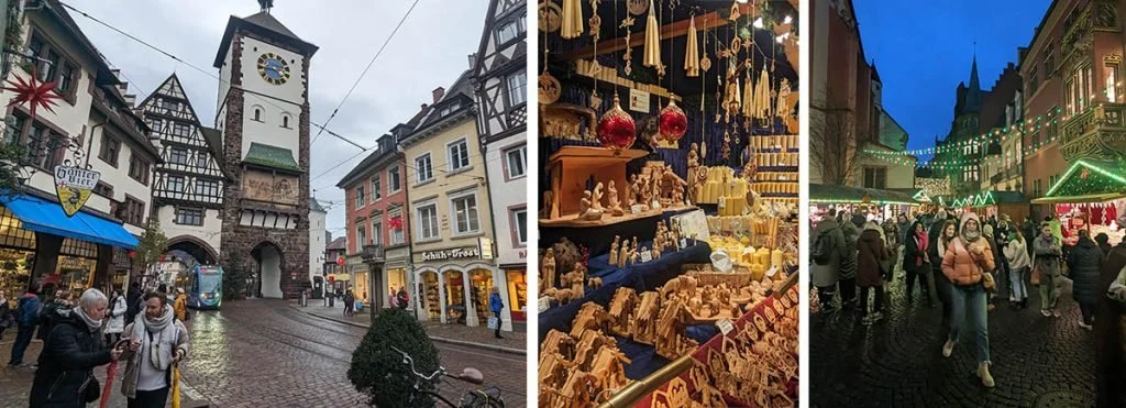 Tourists walk down the 900 year old city of Freiburg during Christmas.