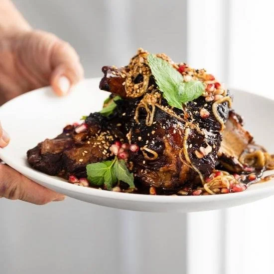 Braised lamb shank with pomegranates and basil from One Fifth Houston.