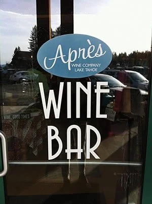 The sign on the window of Apres Wine Company Lake Tahoe.