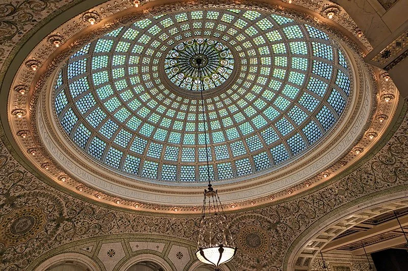 The Chicago Cultural Center's Tiffany dome with beautiful murals and lights.