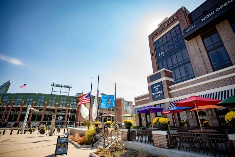 Lodge Khoeler stands adjacent to Lambea Field on a sunny day.