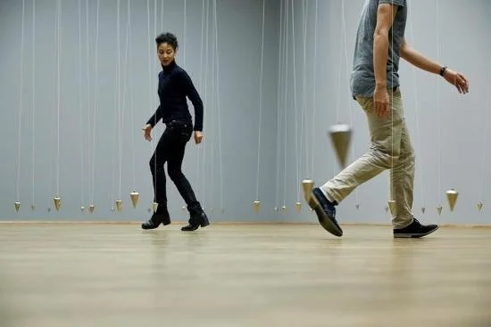 A man and a woman explore William Forsythe's Choreographic Objects exhibit.