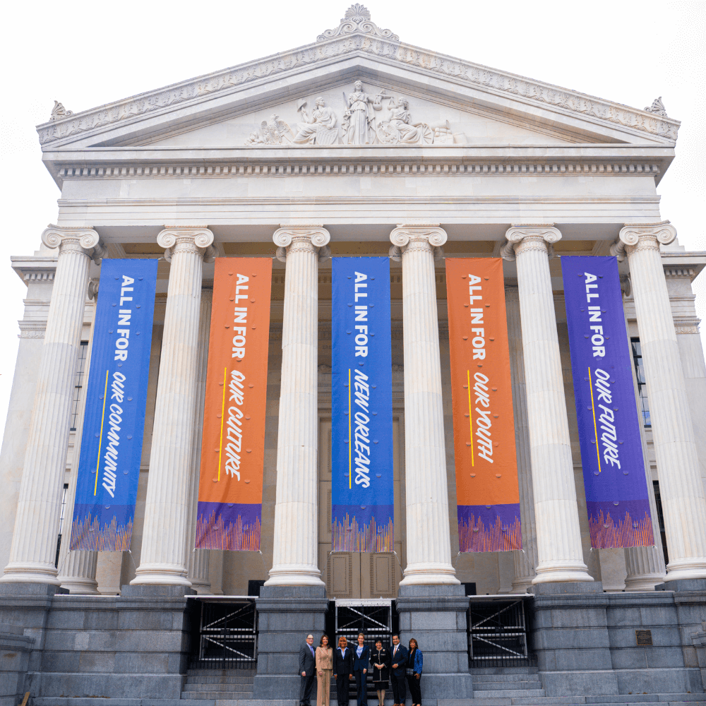 Inauguration Committee poses for a photo with Mayor Elect Helena Moreno in front of Gallier Hall