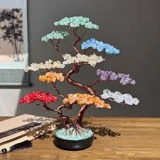 Colorful decorative tree sculpture with layered branches and cloud-like leaves in various colors
