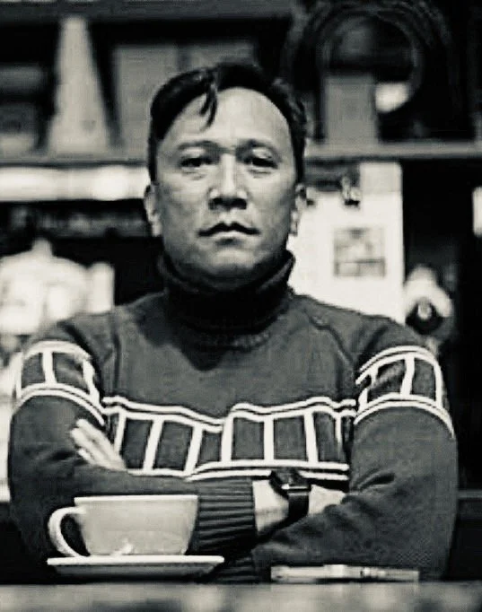 Portrait of John Quintos