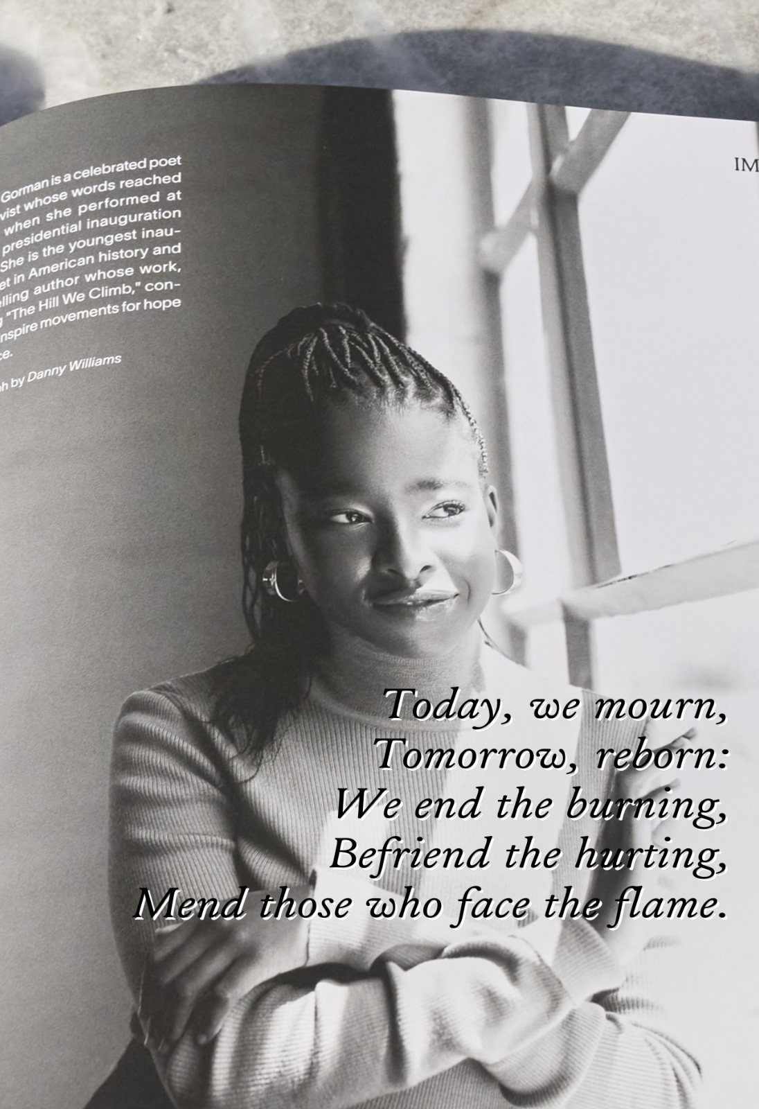 Black and white portrait of a young woman with braided hair, wearing hoop earrings and a light-colored sweater, seated with arms crossed, near a window, with an inspirational quote overlaid: "Today, we mourn, Tomorrow, reborn: We end the burning, Befriend the hurting, Mend those who face the flame."