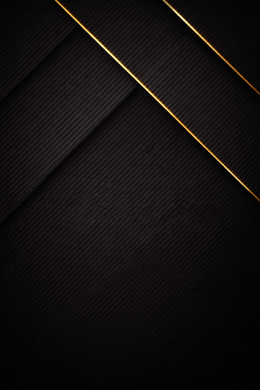 Close-up of a black textured surface with thin glowing orange lines.