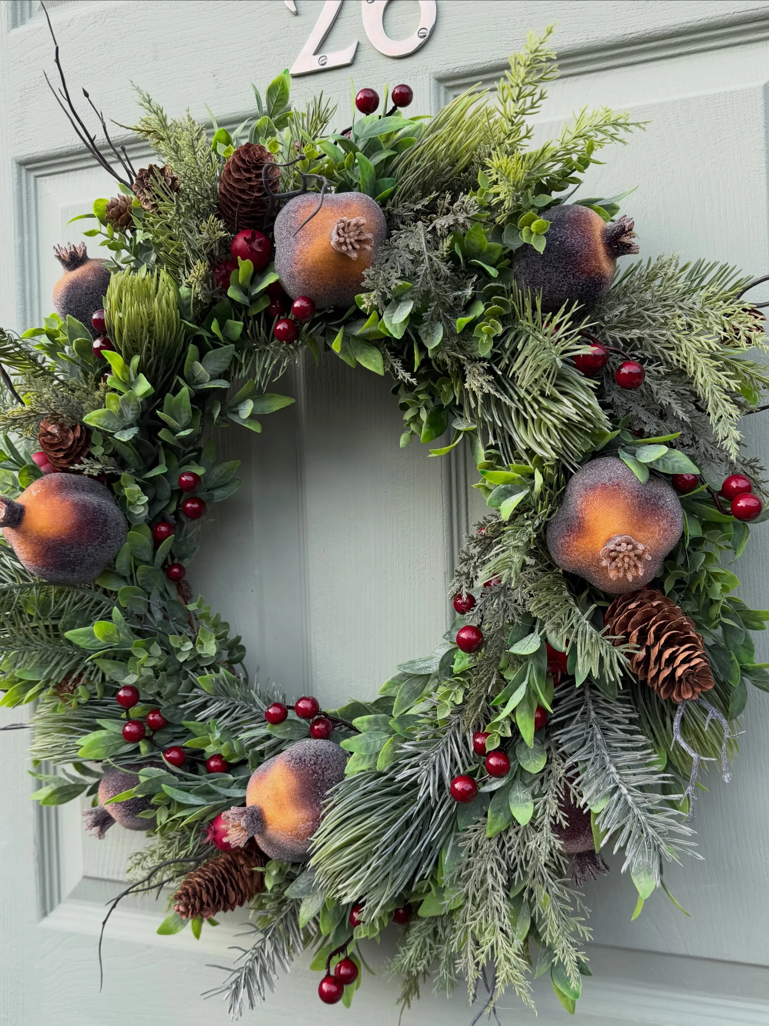 The festive pomegranate wreath is now on the website - link in my bio - it finally stoped raining, so I could get my photos done - I take all my product photos on a prop door outside (no AI) so the rain was delaying me getting the wreath on to the we