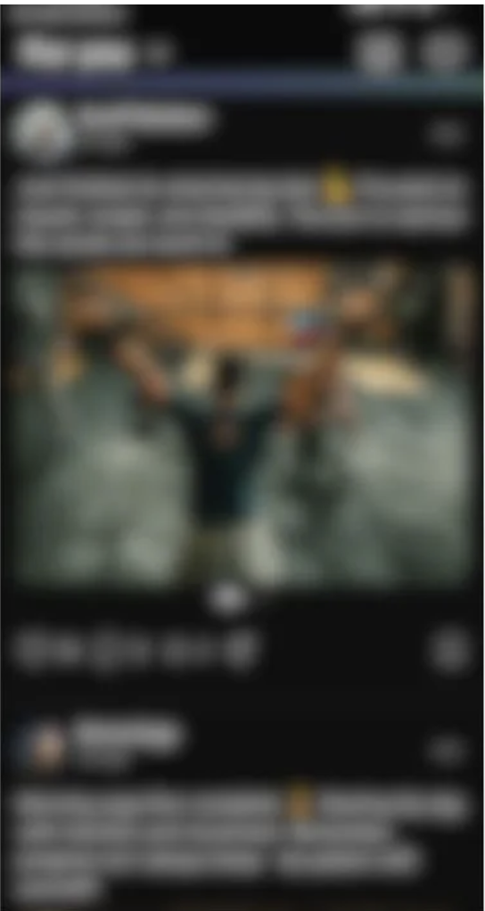 A blurred image of a digital screen displaying a message or content in a dark-themed interface, with a central object that appears to be a figure or figure-like shape, and text sections above and below.