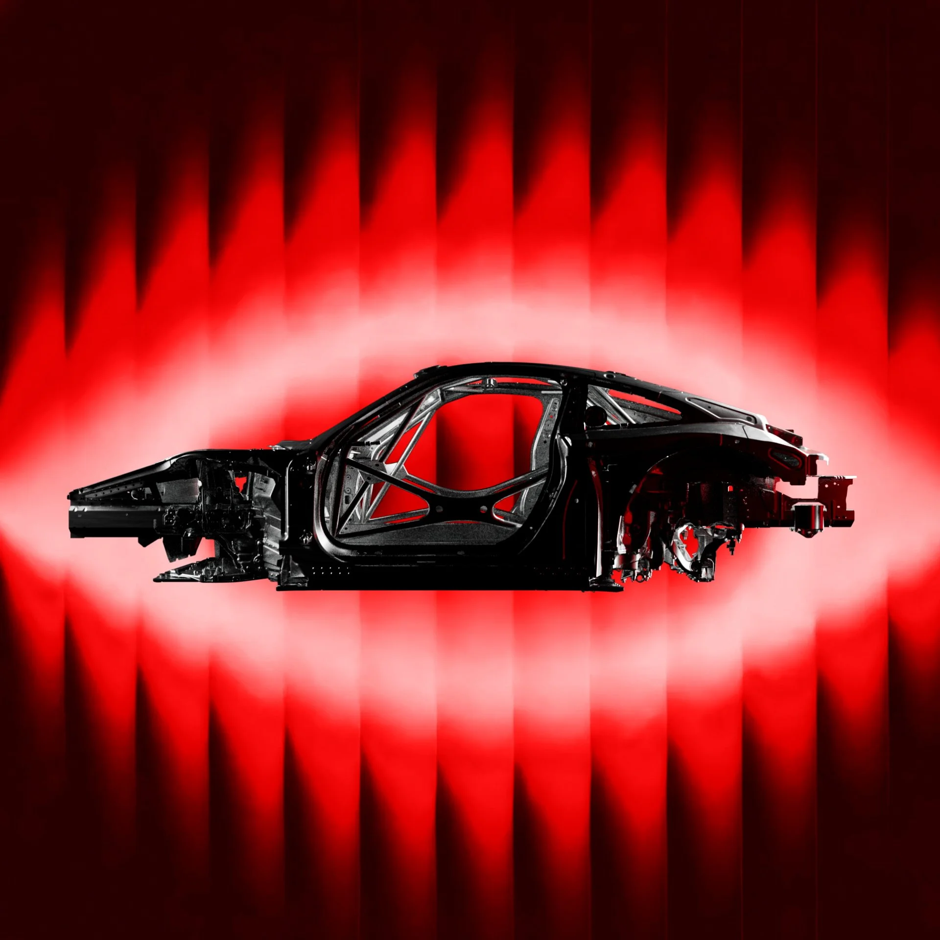 Ein Auto in einem schwarzen Rahmen mit roten Lichtern im Hintergrund.