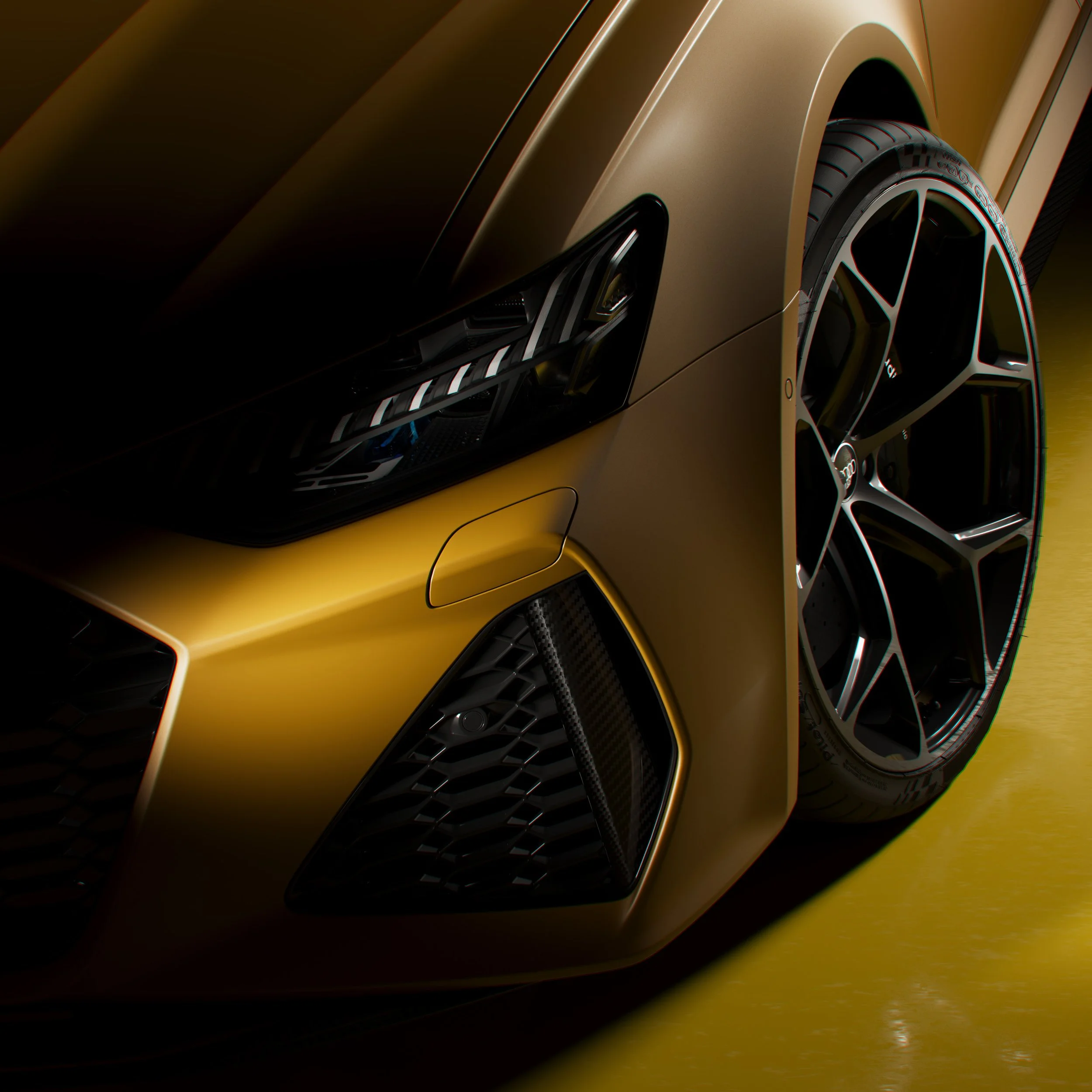 Nahaufnahme eines gelben Luxusautos mit schwarzem Emblem und Designakzenten.