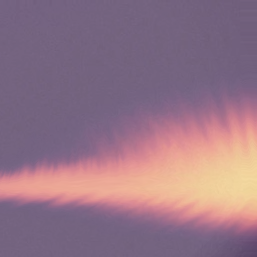 Abstract image with a fiery orange and yellow streak against a dark background.