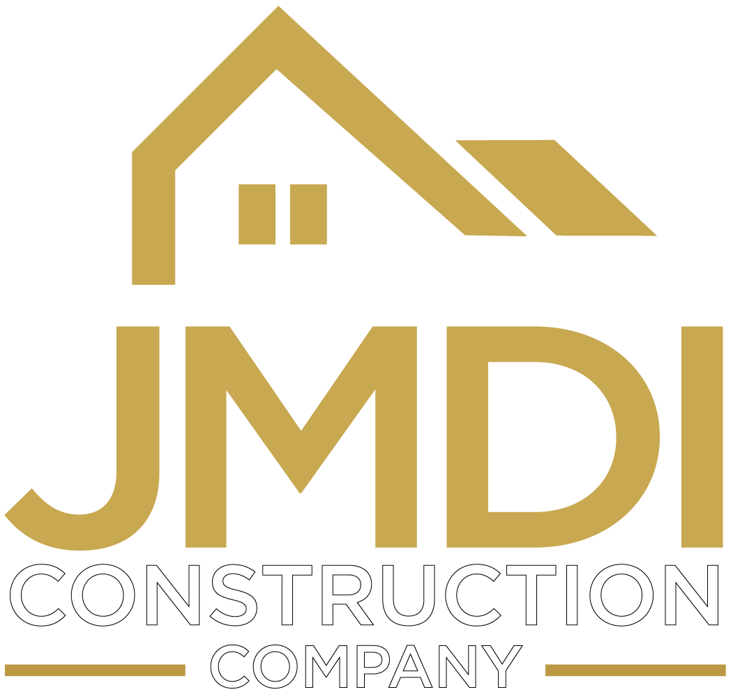 Logo for JMDB Construction Company featuring a house outline in gold and white text on a black background.