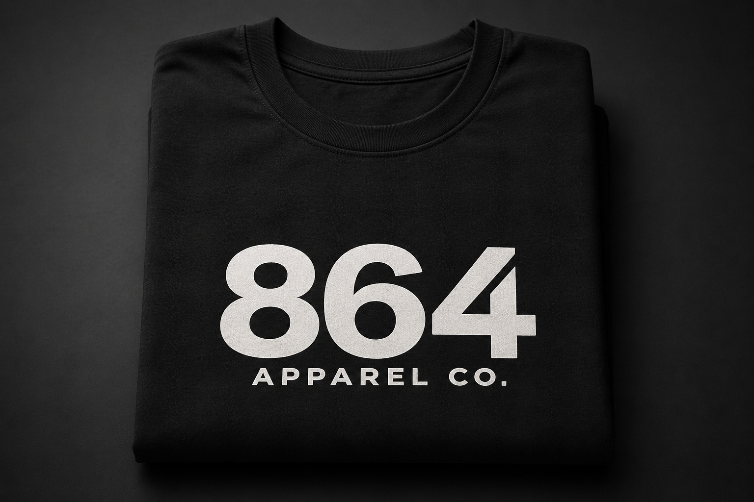 Black t-shirt with white printed text reading '864 APPAREL CO.'