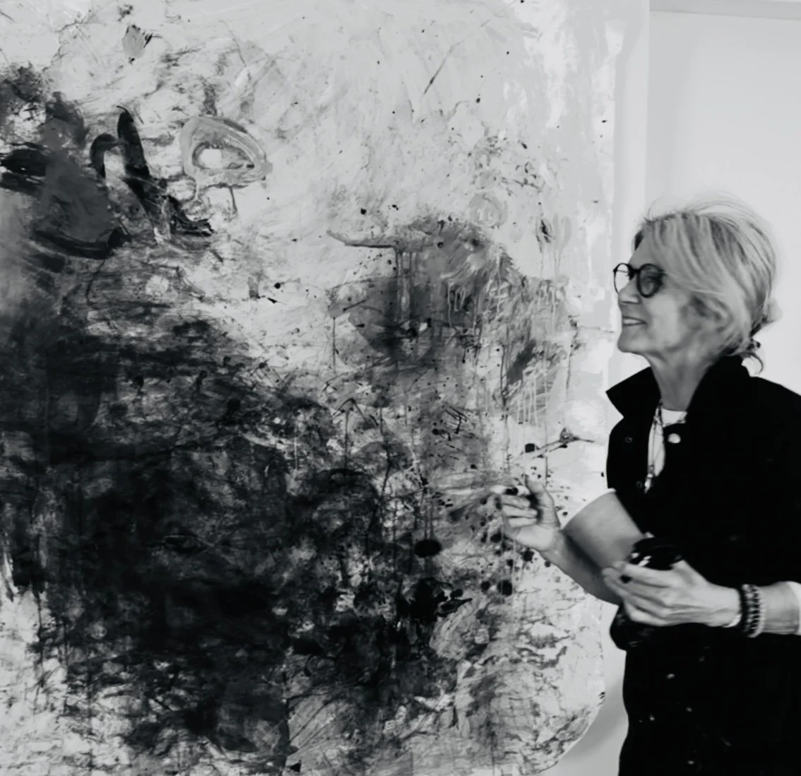 Nic Fife with one of her paintings.