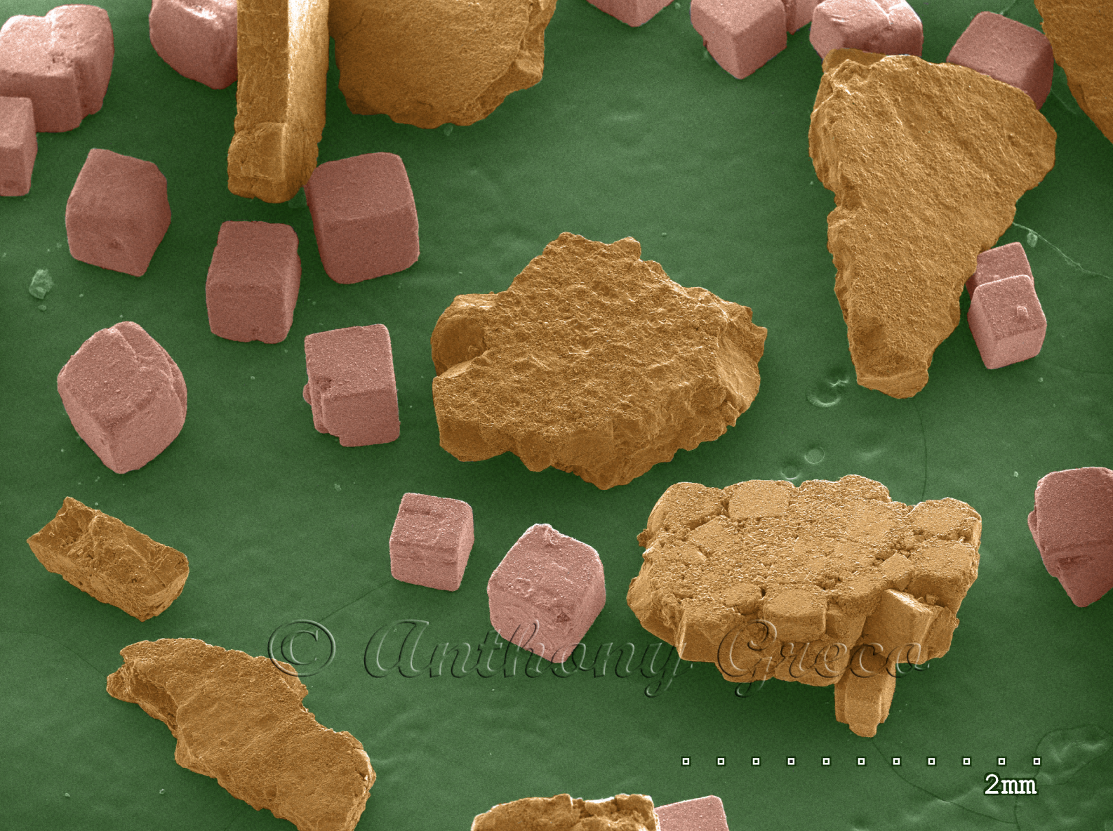 Kosher salt (tan) and table salt (pink)