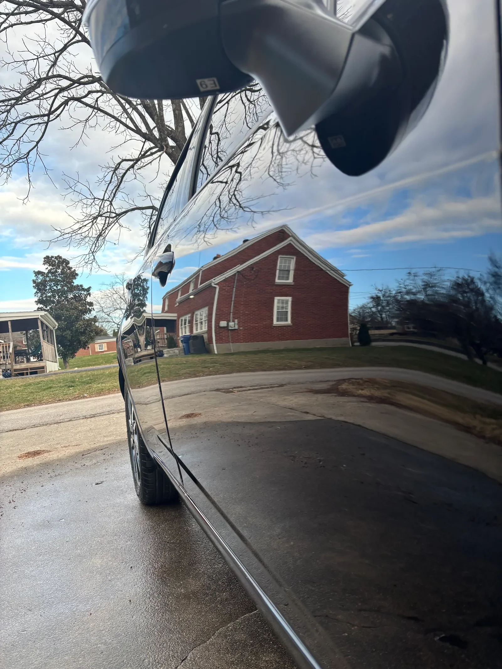 Mobile car detailing service performed at customer driveway