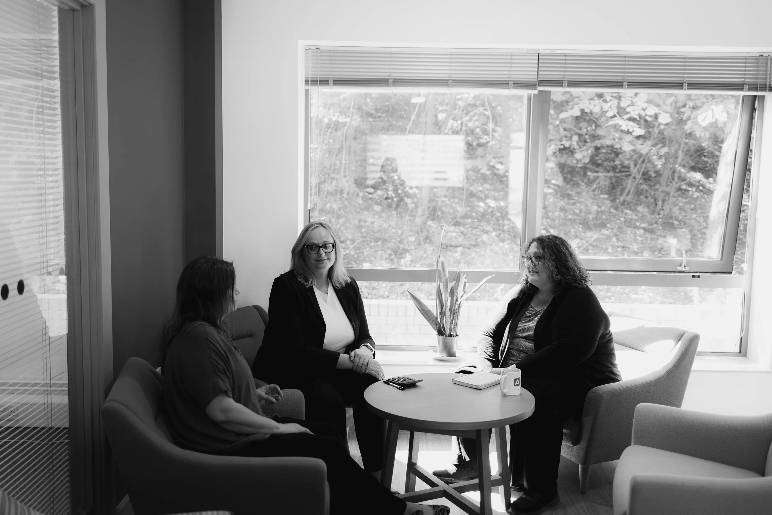 Construction Tax & Finance team discussing client finance and tax strategy