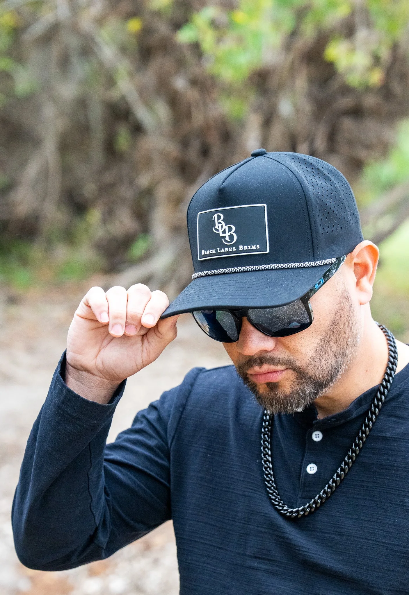 black label brims hat for outdoor performance against the elements