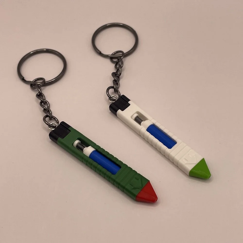 3D Tisk - stimshot klíčenky v zelené a bílé barvě