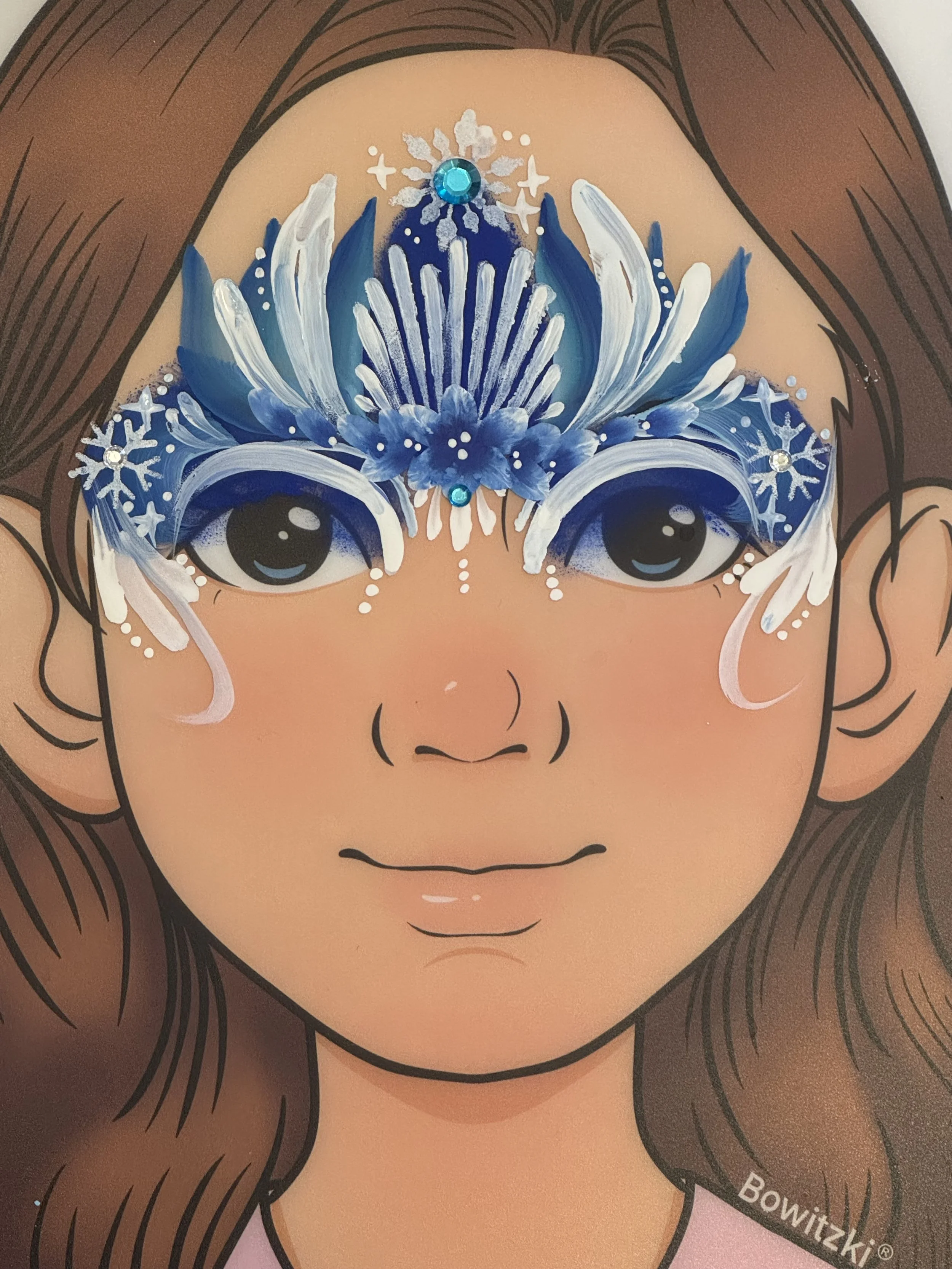 Frozen crown since Elsa still reigns. Excellent face paint for a Sacramento princess party.