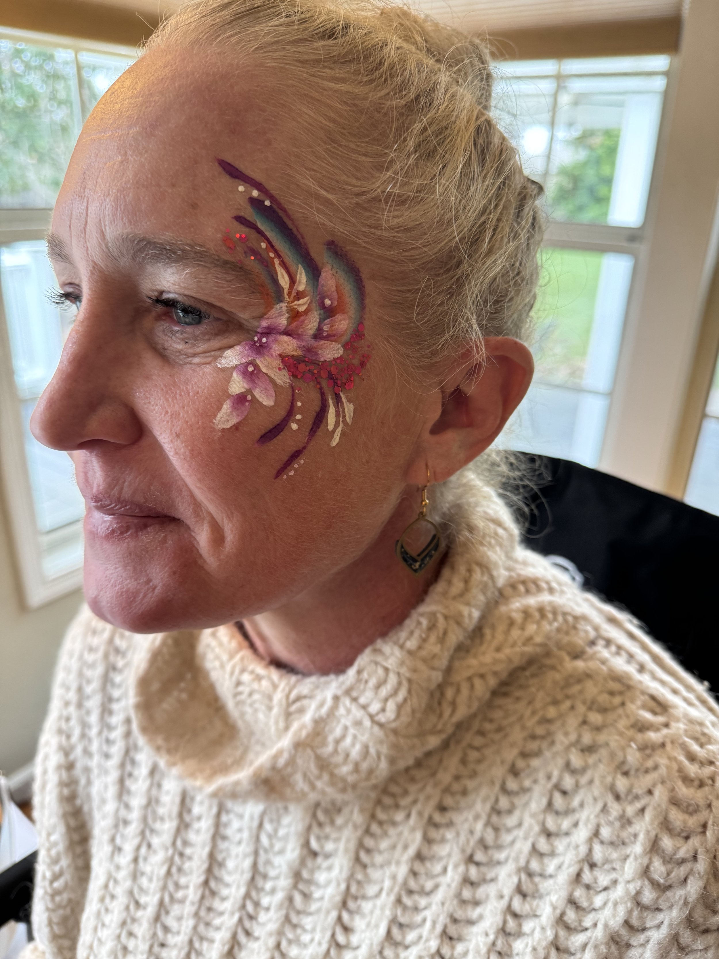 Face painting at a Sacramento birthday party.