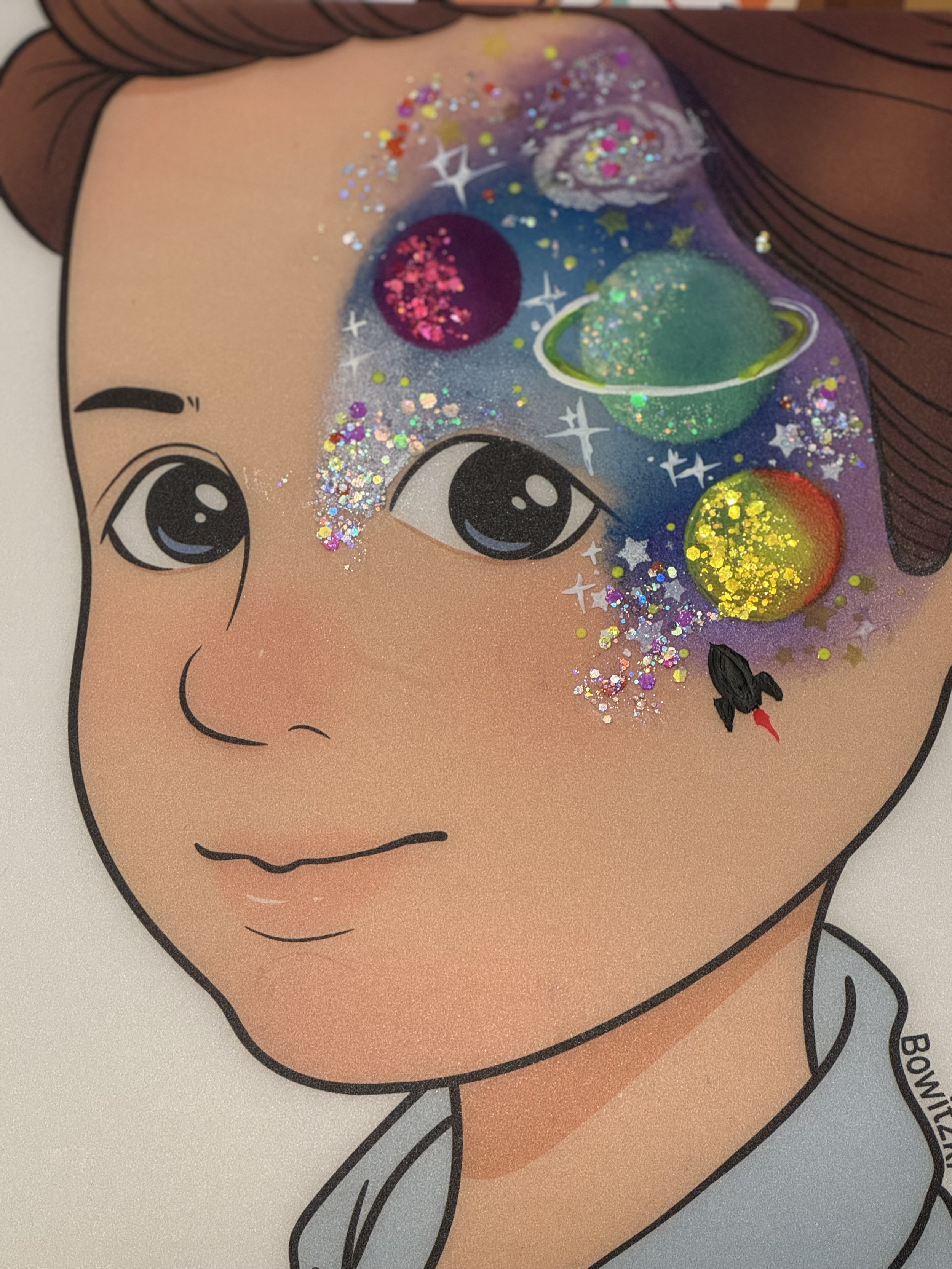 Glitter galaxy face paint design for Sacramento parties.