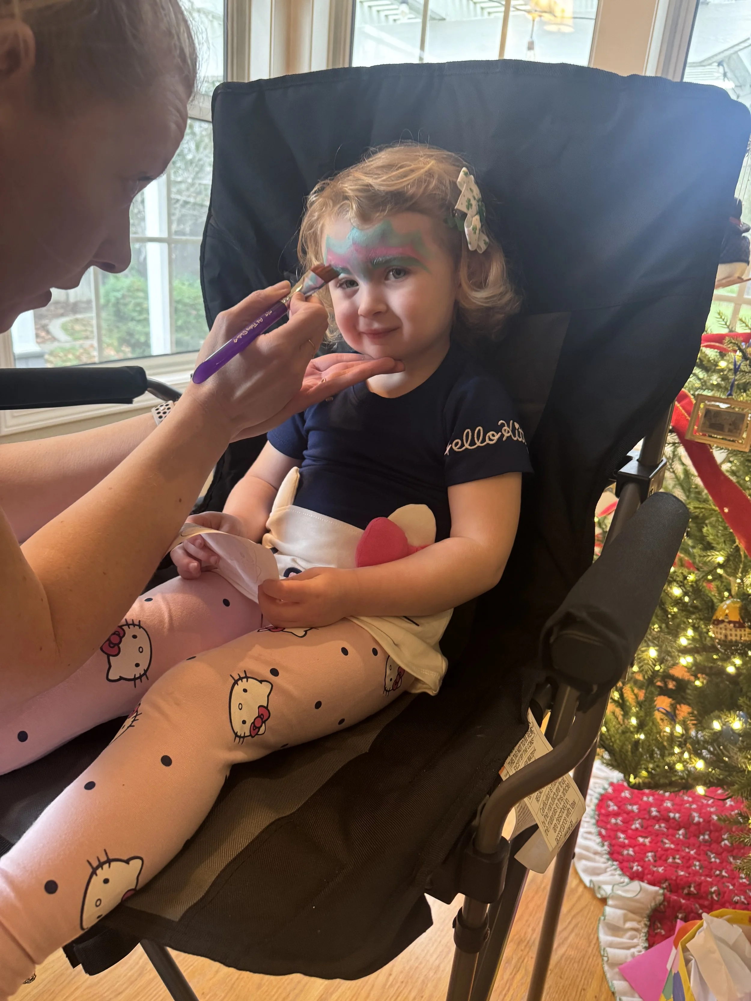 Face painting at a Sacramento birthday party.