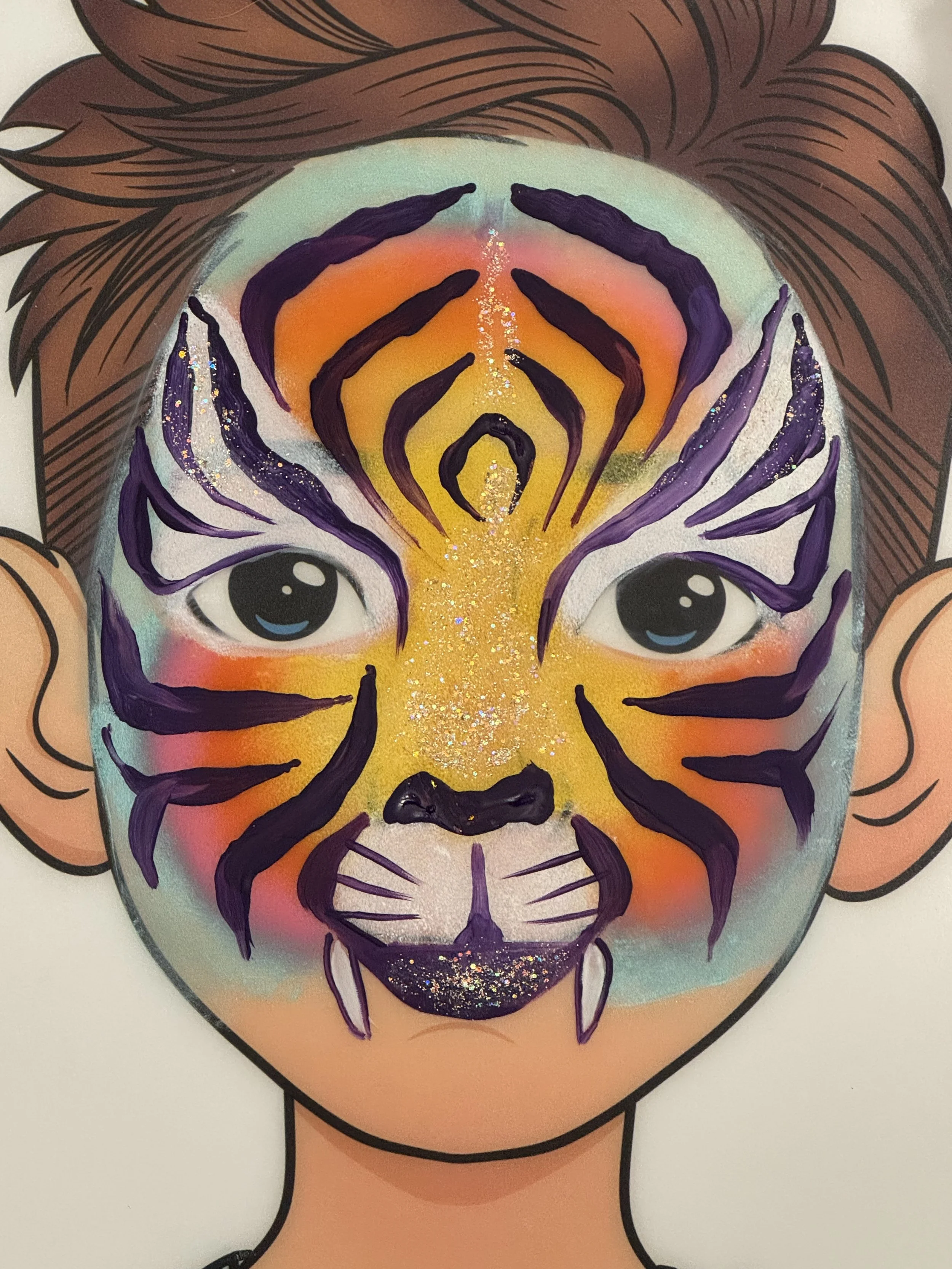 Customized tiger color scheme face paint. Choose custom colors for your party menu.