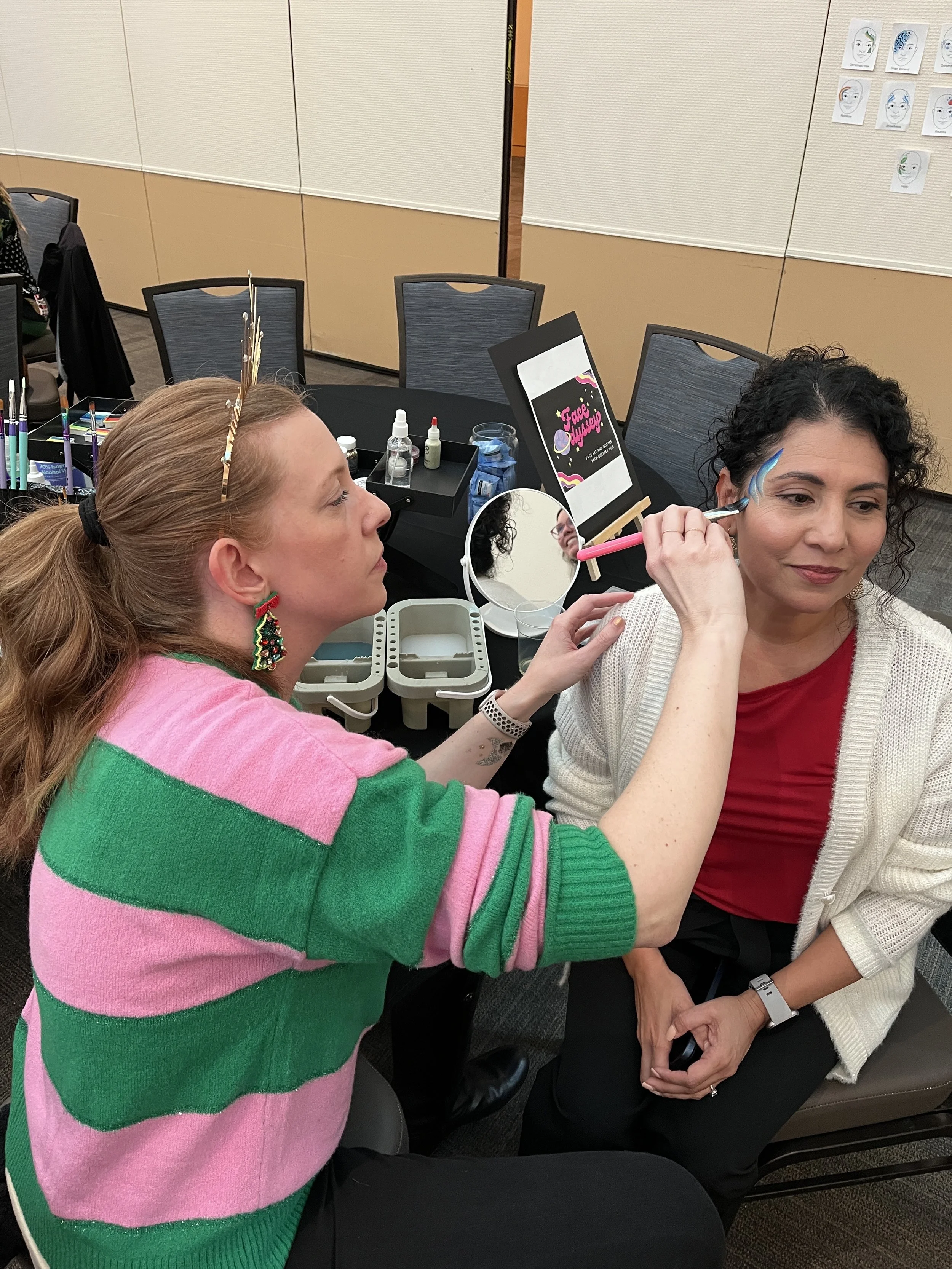Face painting at a Sacramento corporate event.