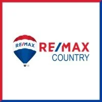 RE/MAX Country logo featuring a hot air balloon with red, white, and blue colors.