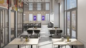 Empty modern restaurant with black chairs and white tables, large windows, and purple artwork on the back wall.