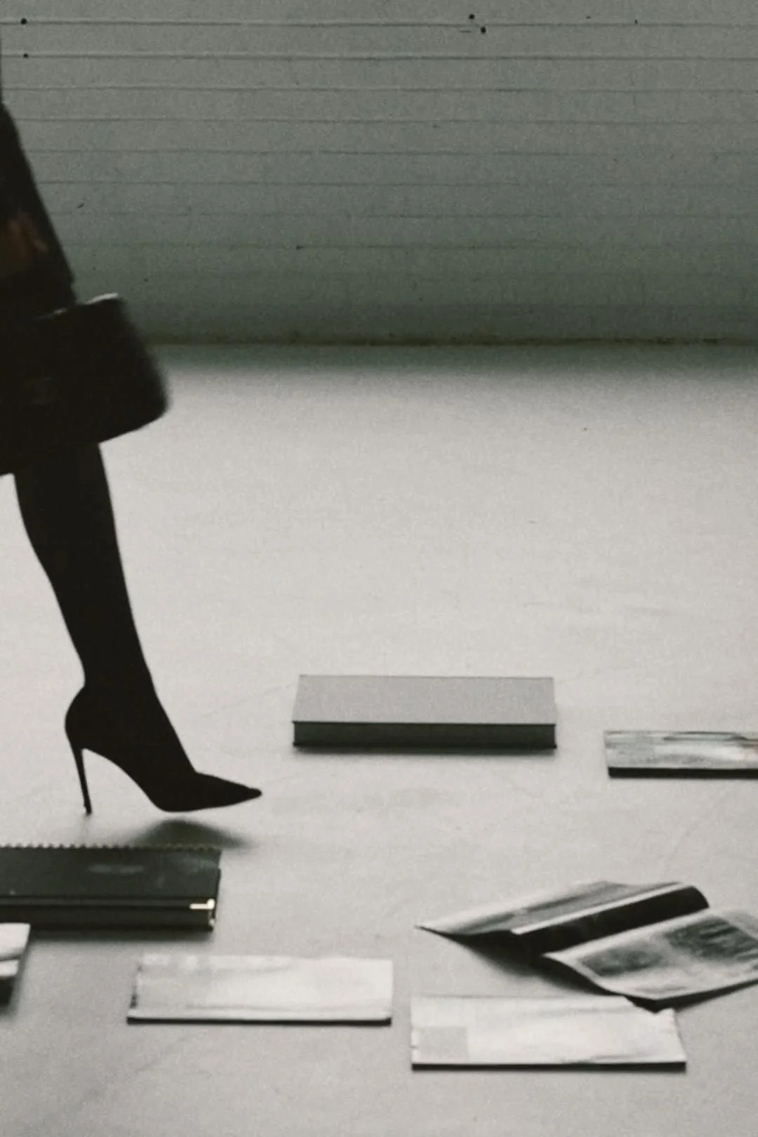 Brand designer working on a branding, curation, and web design project.