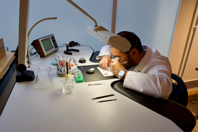 Ponti Collection Watchmaker inspecting a watch