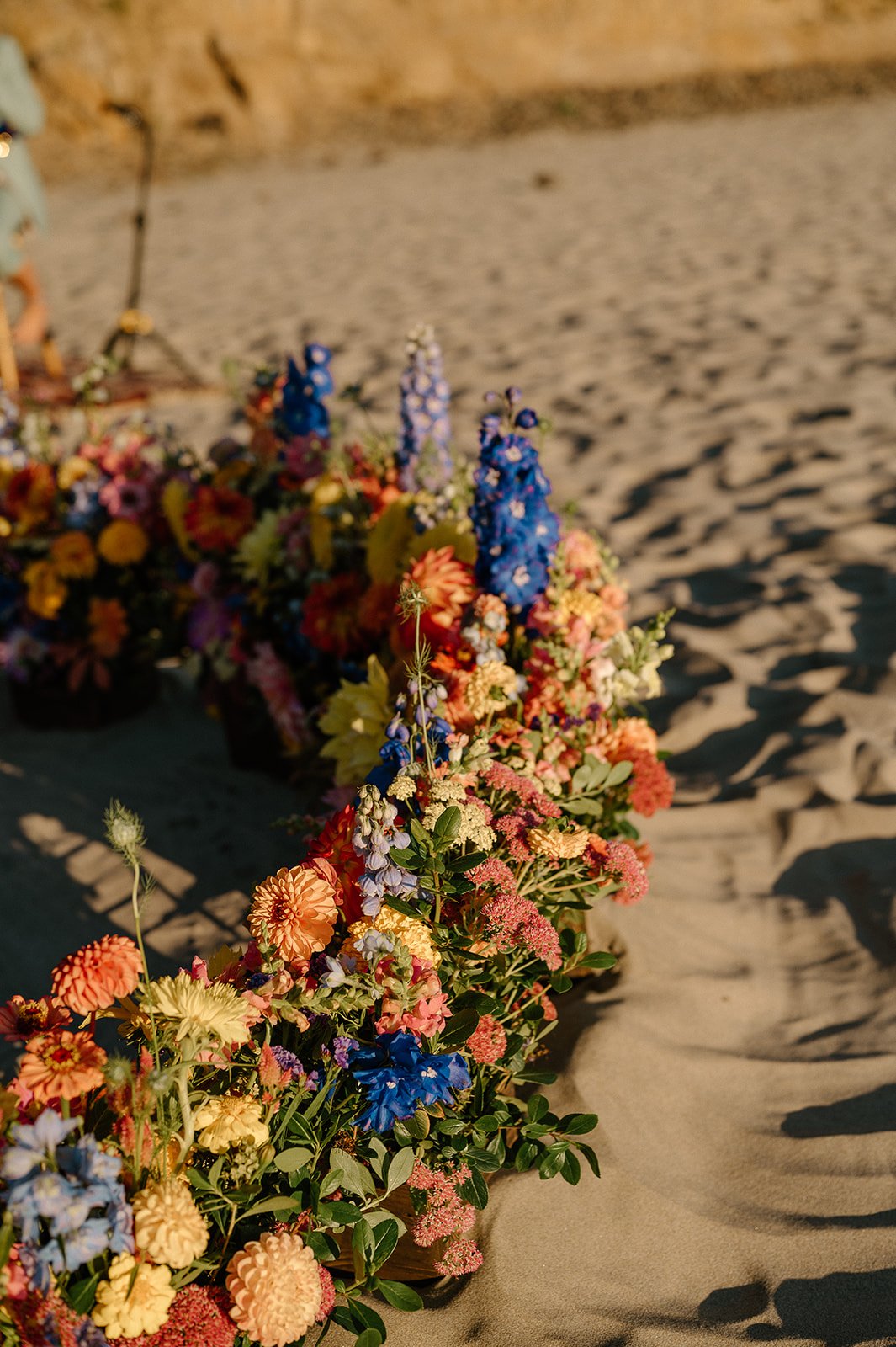 Colorful grounded floral arch on a sandy beach.

Photo by Forgette Photo
Venue: the beautiful Oregon Coast