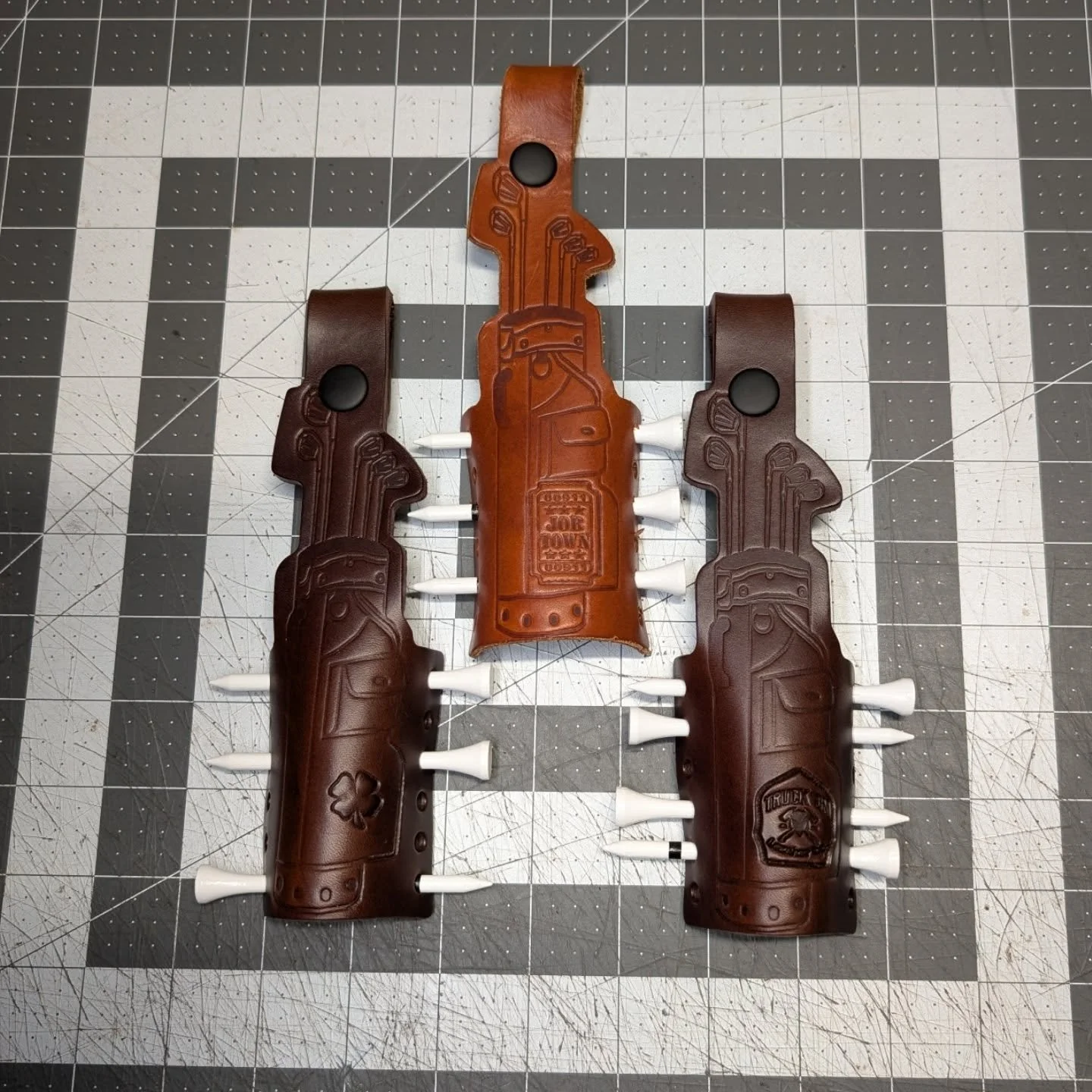 *Something a little different!* 

Guaranteed to not make you play any better, but your bag will look cool! 

-Holds 6 Tees! 
-Can sport some cool 1" stamps! 
-Made of Leather! 

Reach out if you need 1 or 25!