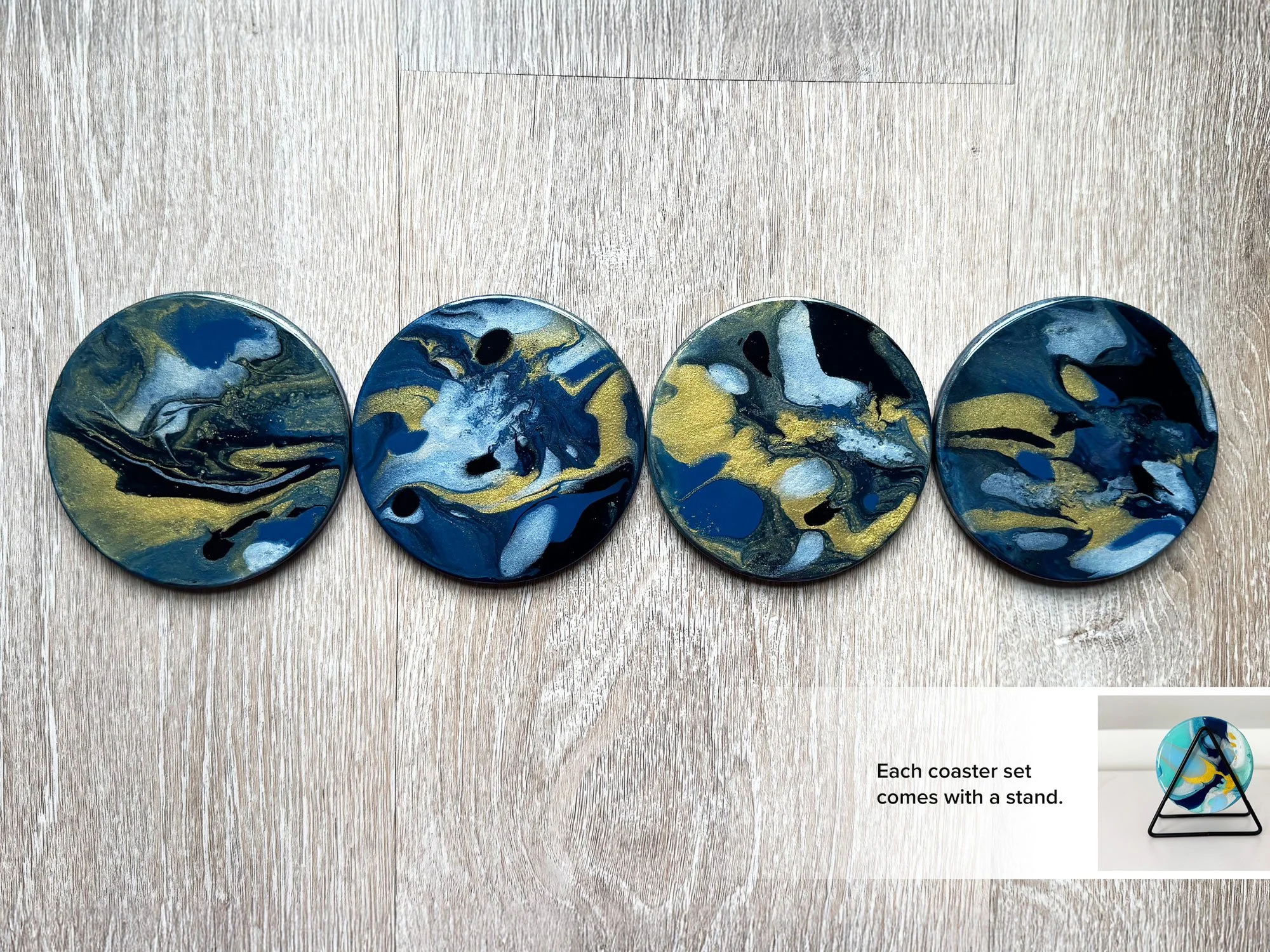 Four handmade ceramic abstract art coasters with glossy resin finish.