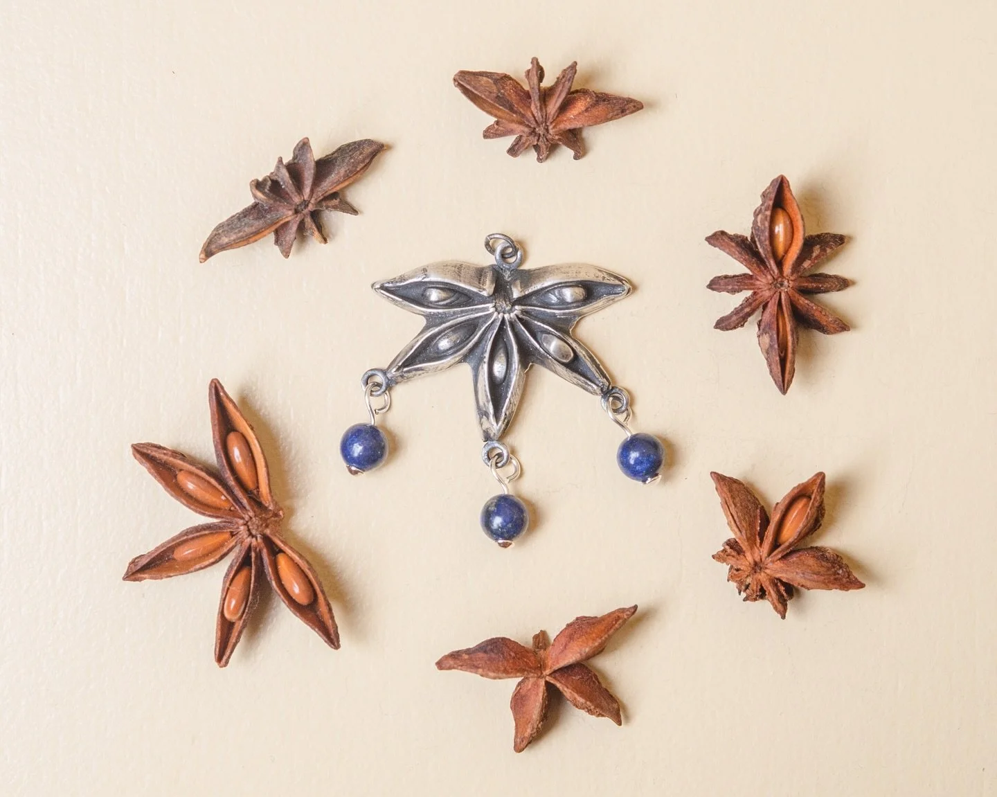 A small silver talisman, touched by deep lapis lazuli blue and starlike shapes. ✨
 And a little reminder: the giveaway is still open, and you can still enter.

When Moonlit Manor reaches 111 followers, one of you will win a silver piece from the coll