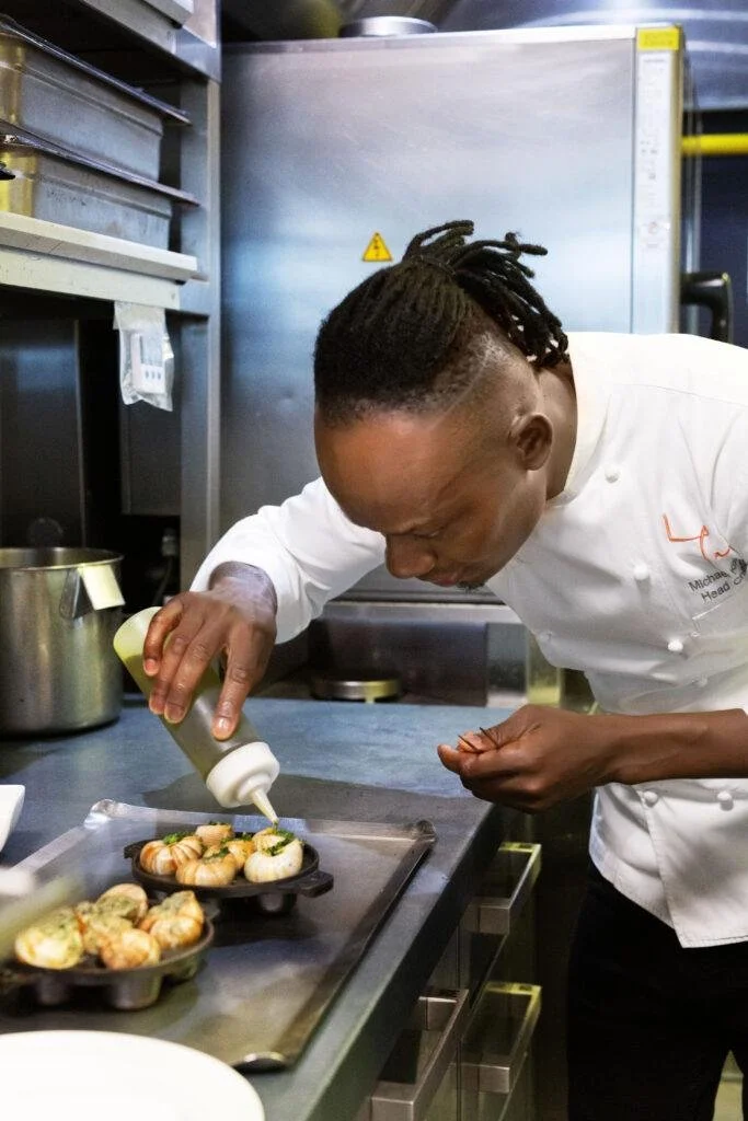 la petite maison escargots chef Michael.jpg