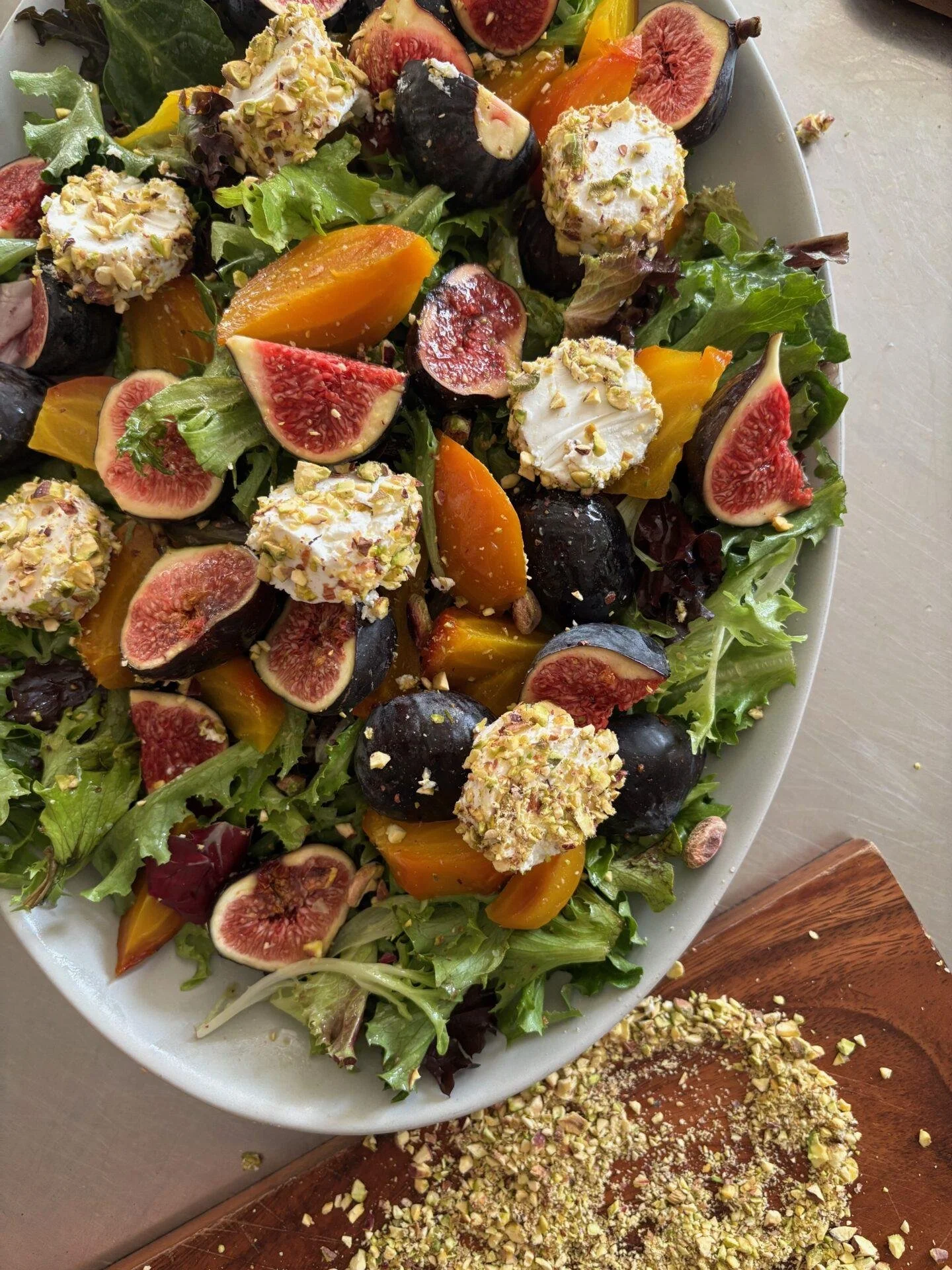 BEETROOT SALAD WITH PISTACHIO GOAT CHEESE AND MAPLE ORANGE VINAIGRETTE
