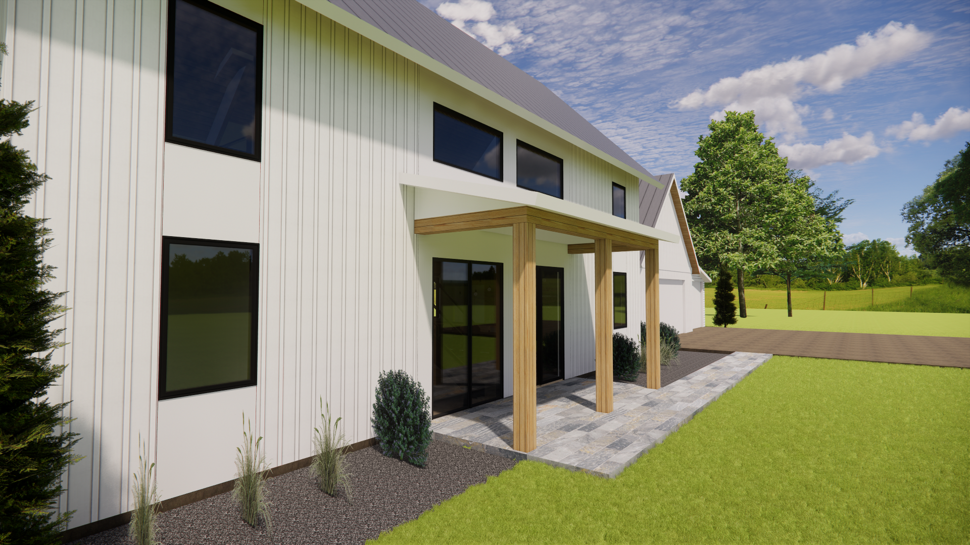 A modern two-story house with white vertical siding, black framed windows, and a metal roof. There is a small covered patio area with wooden posts and a stone pathway. The house is surrounded by a grassy lawn and trees under a partly cloudy sky.